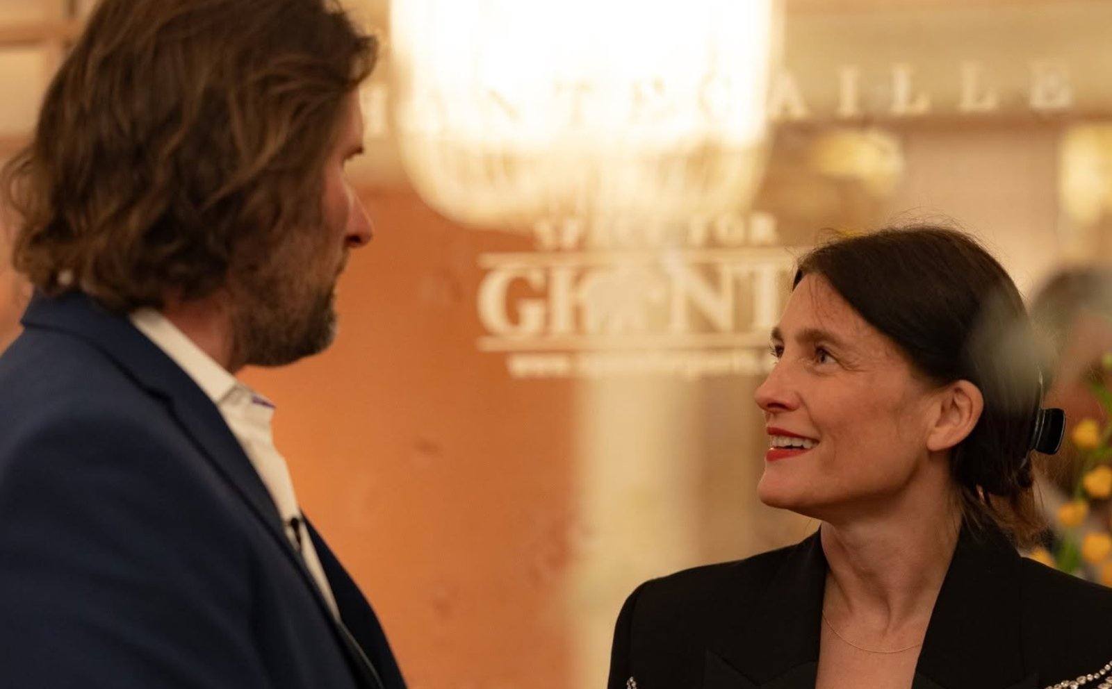 Guests in conversation at the dinner