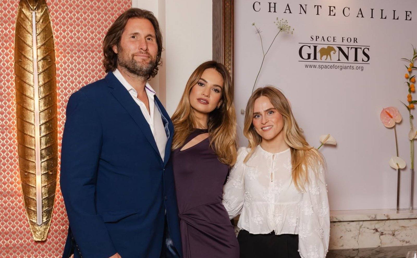 Lily James with guests at the dinner