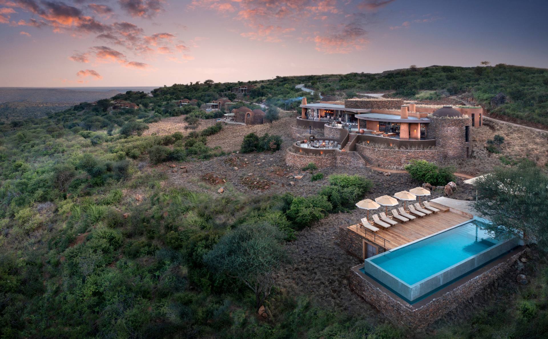 Aerial view of the andBeyond Suyian Lodge at dusk