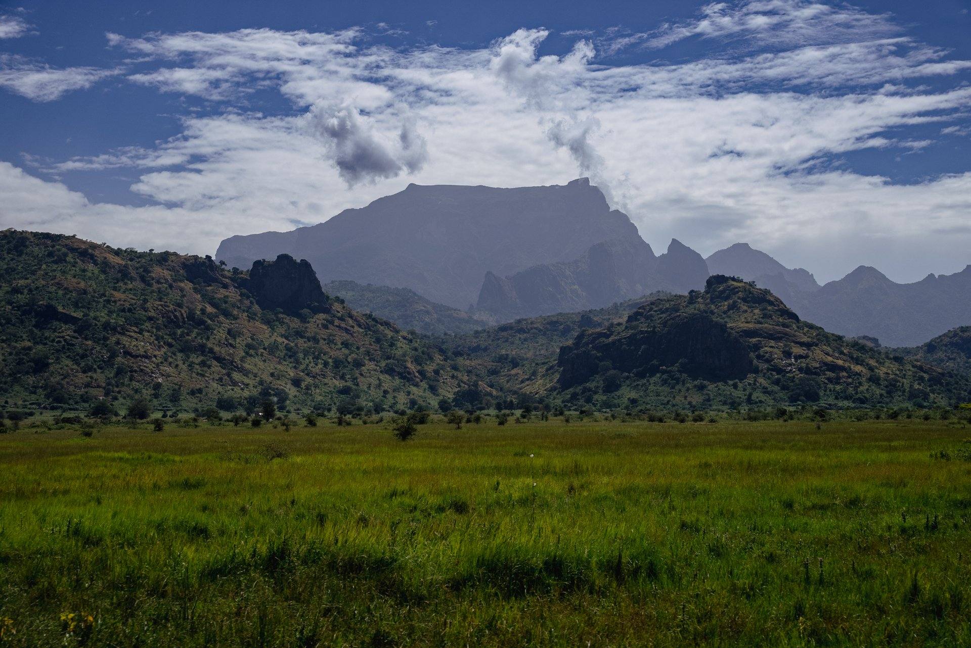 Mount Kadam rising over the Pian Upe grassland